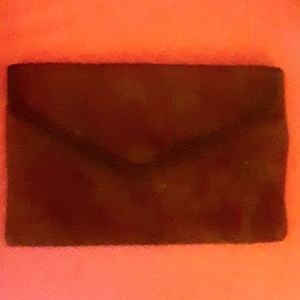 Brown suede clutch